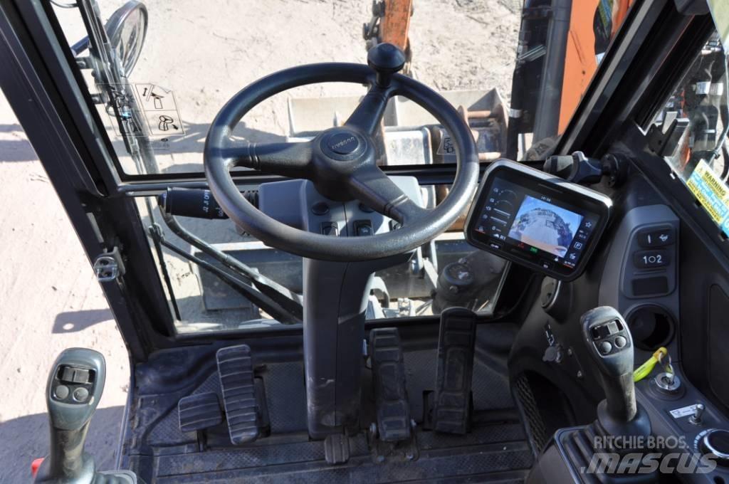 Doosan DX 100-7 Pelle sur pneus