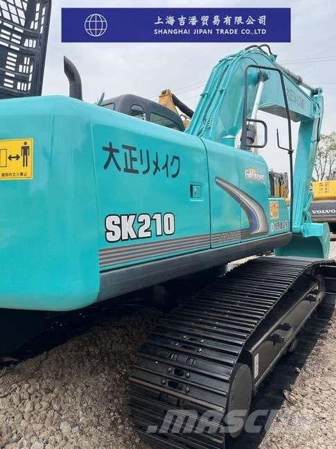 Kobelco SK 210 Pelle sur chenilles