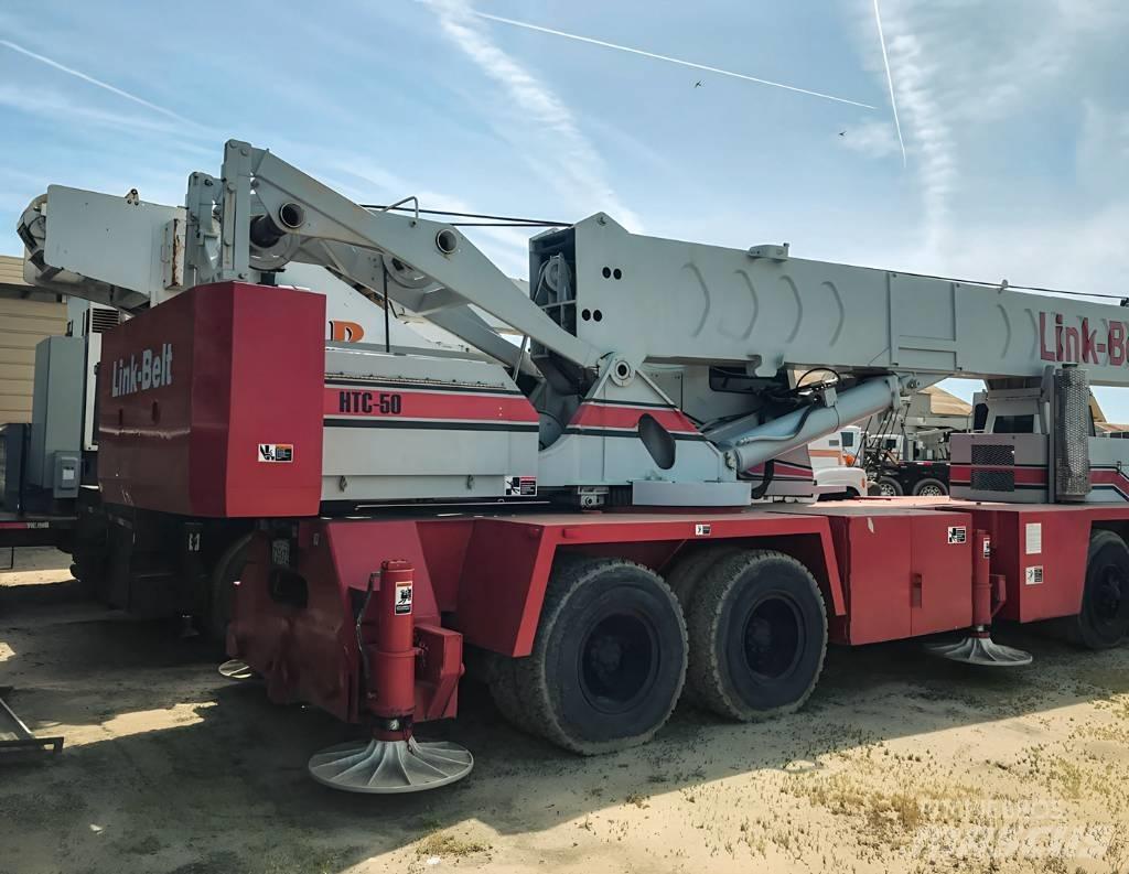 Link-Belt HTC-50 Camion plateau ridelle avec grue