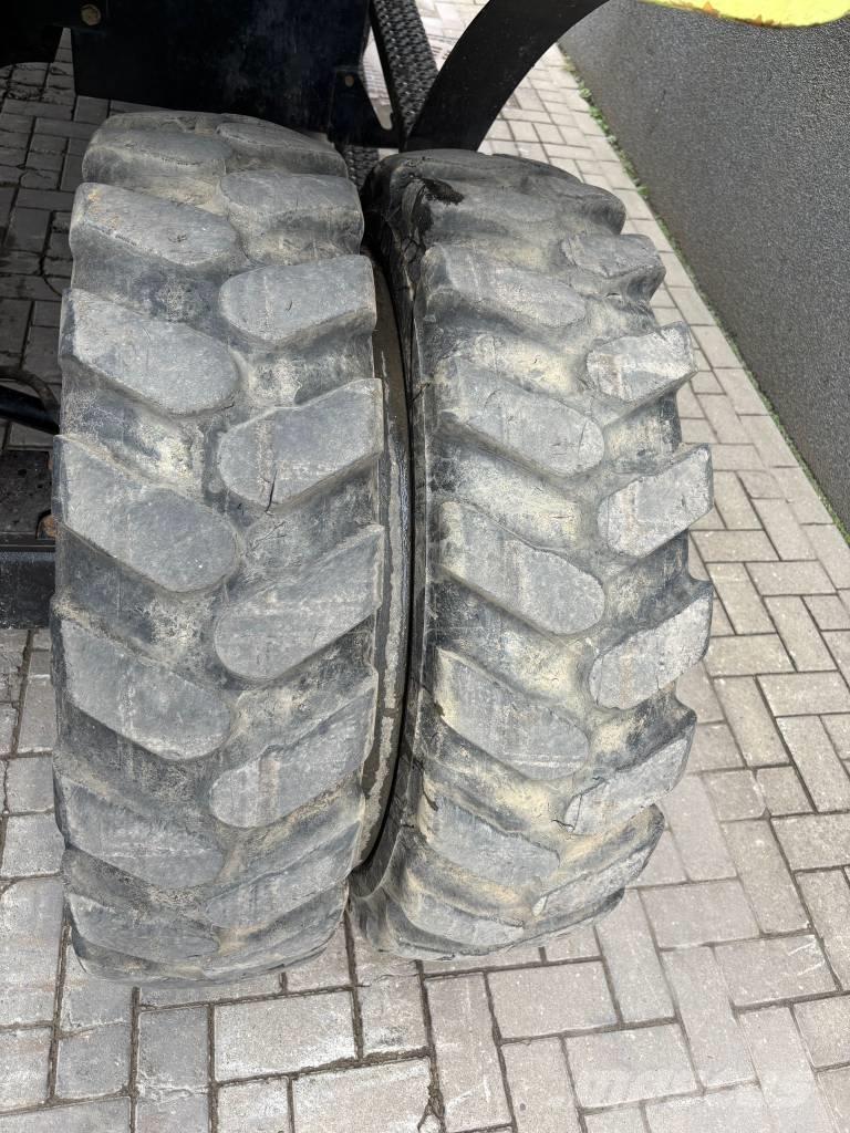 CAT M 320 F Pelle sur pneus