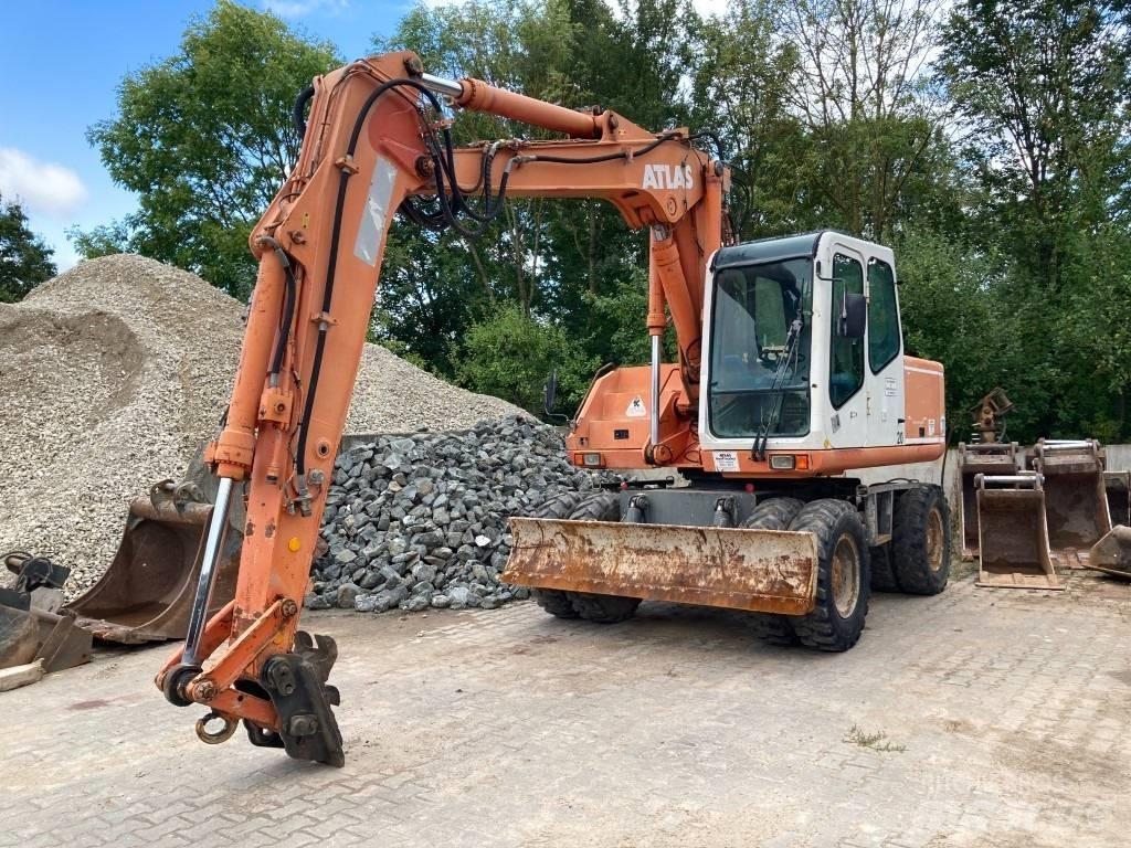 Atlas 1504 Pelle sur pneus