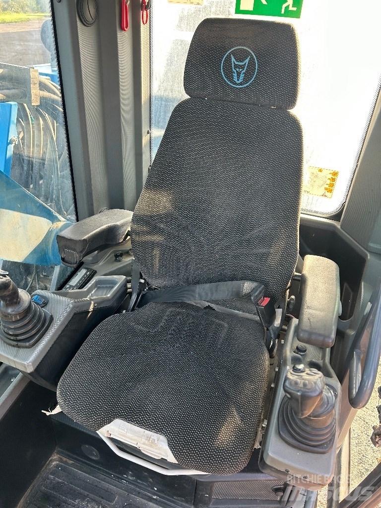 Fuchs MHL 320 T4F Pelle à déchets