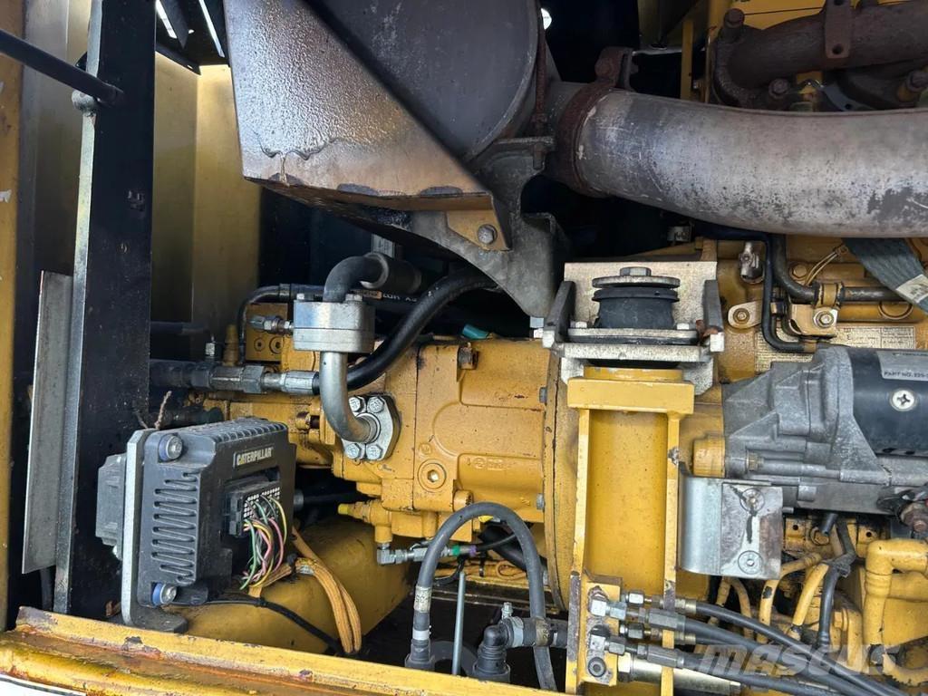 CAT M316D Pelle sur pneus