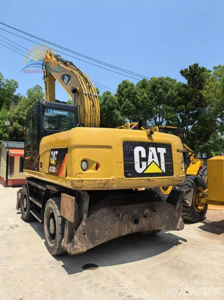 CAT M 315 D2 Pelle sur pneus