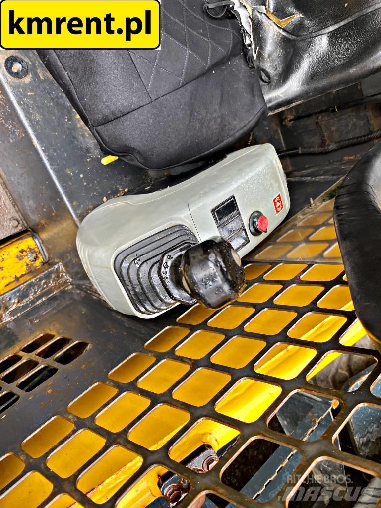 Komatsu SK 815 Chargeuse compacte