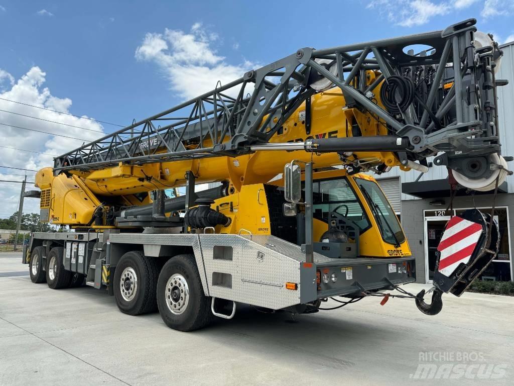 Grove TMS 9000-2 Camion plateau ridelle avec grue