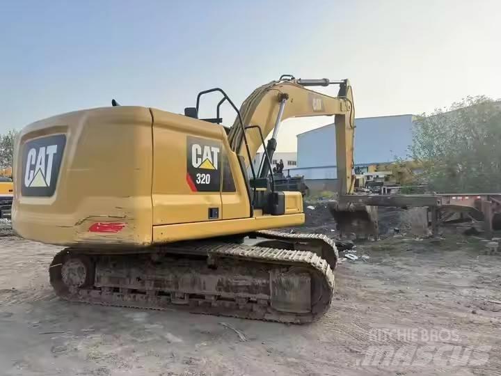 CAT CAT323GX Pelle sur chenilles