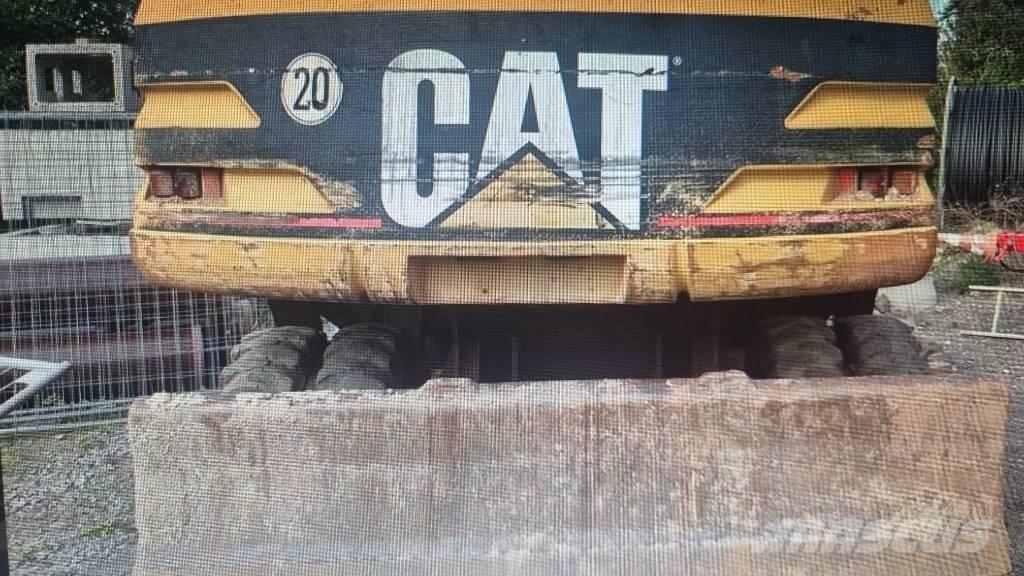 CAT M 315 Pelle sur pneus