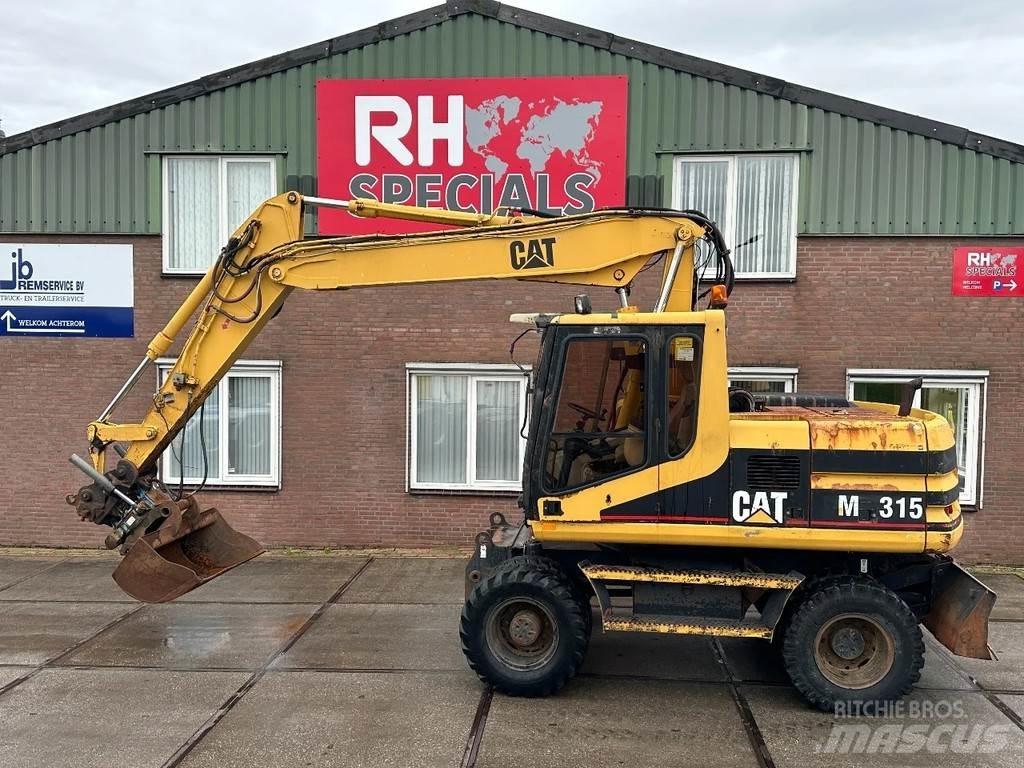 CAT M315 +ROTO CE Pelle sur pneus