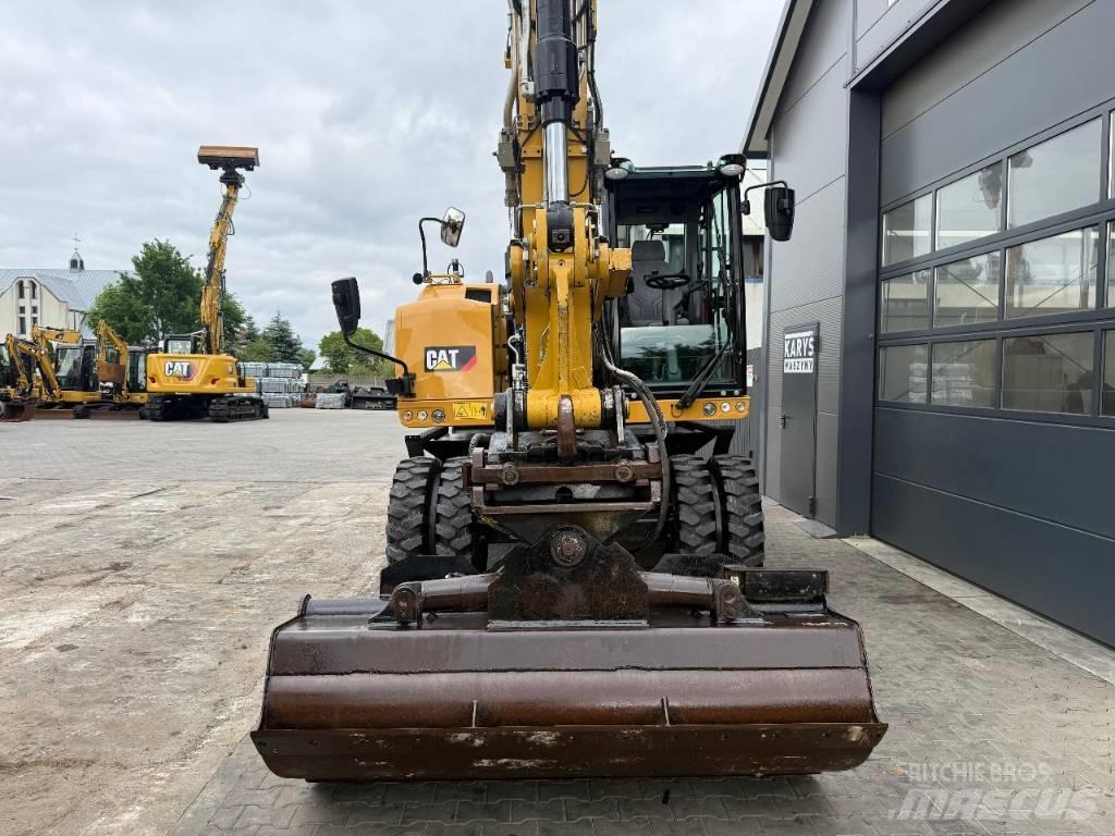 CAT M316F Pelle sur pneus