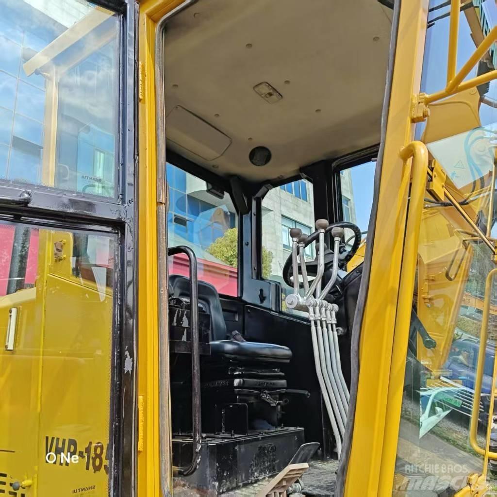 CAT 140 Niveleuse