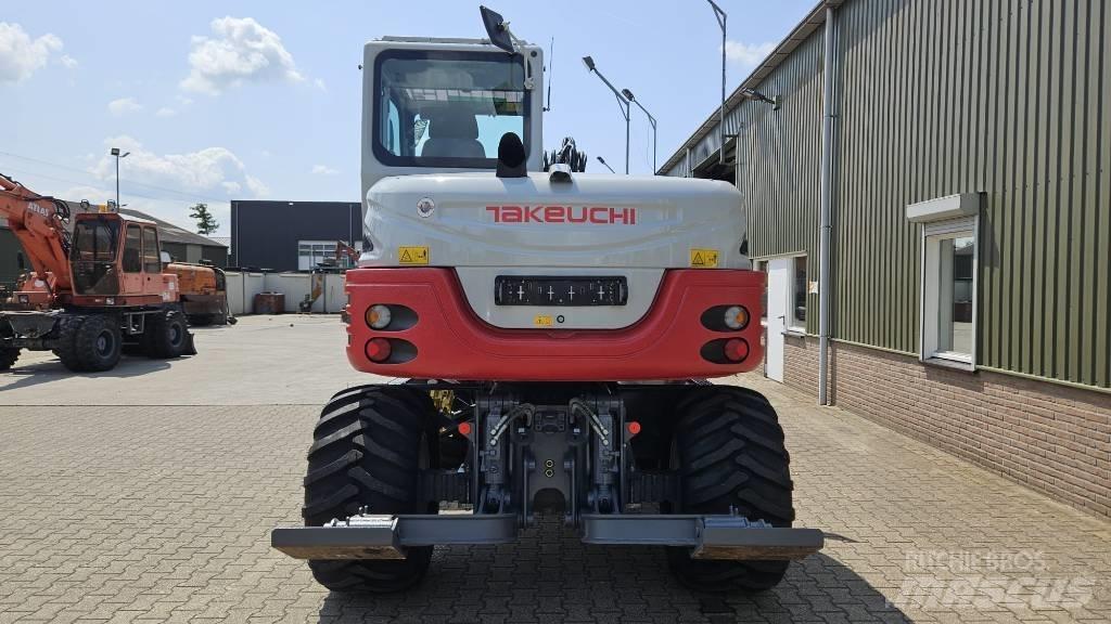 Takeuchi TB295W Pelle sur pneus