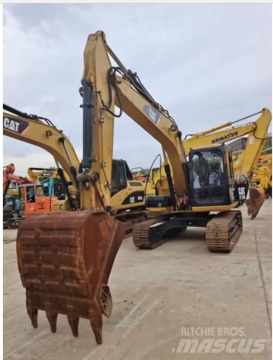CAT 313 D Pelle sur chenilles