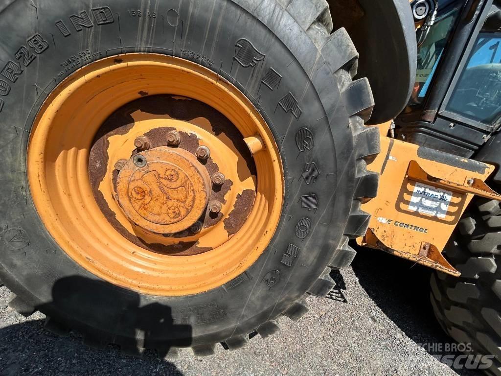 CASE 695 ST Tractopelle