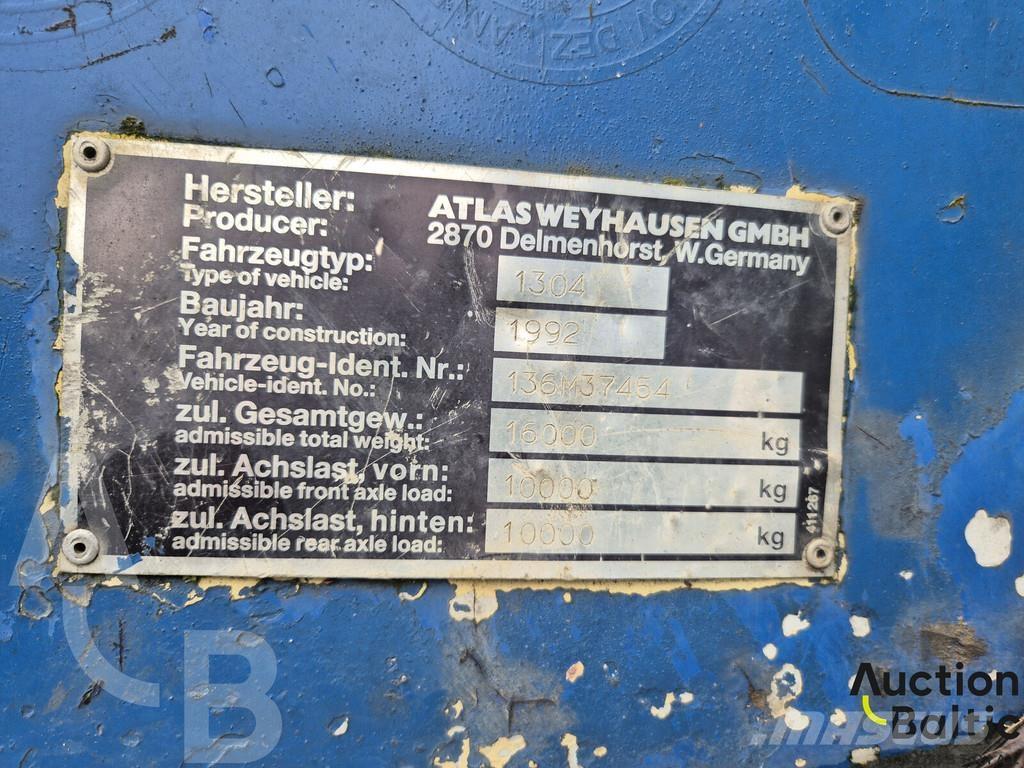 Atlas 1304 Pelle sur pneus