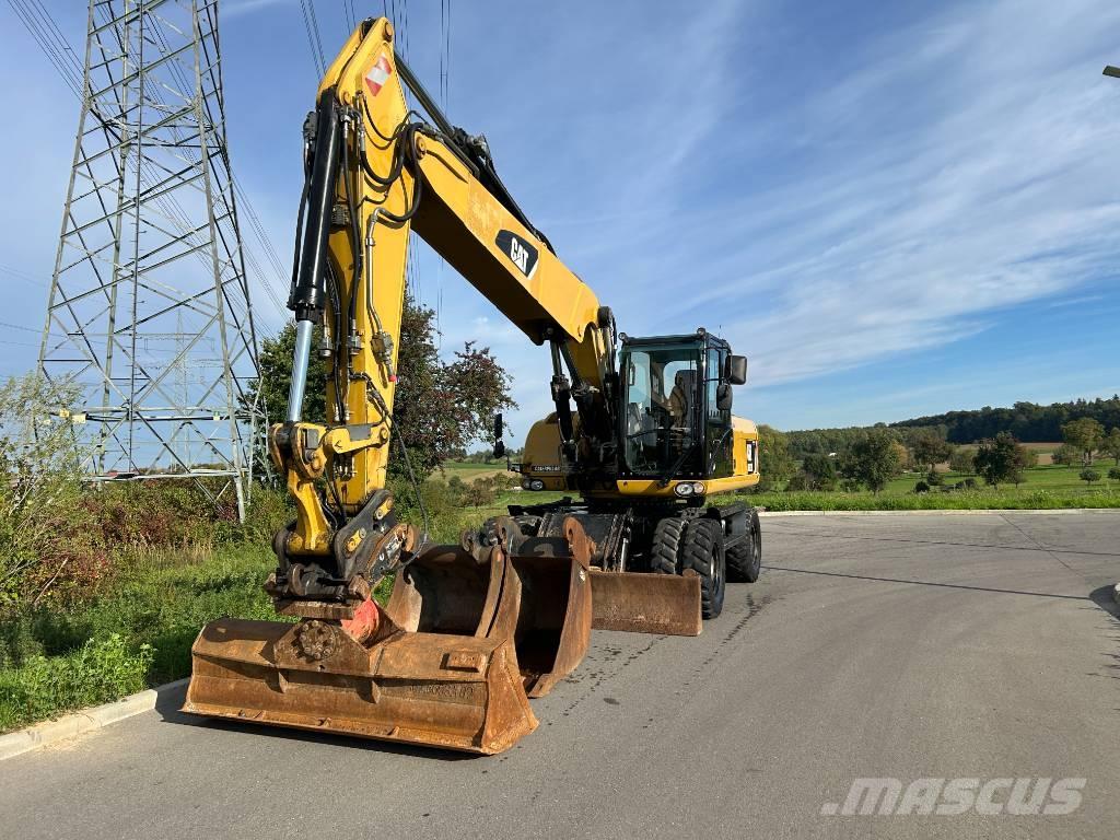 CAT M 322 D Pelle sur pneus