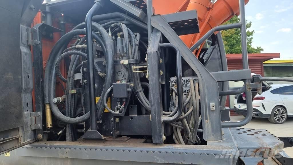 Hitachi ZX 140 W-3 Pelle sur pneus
