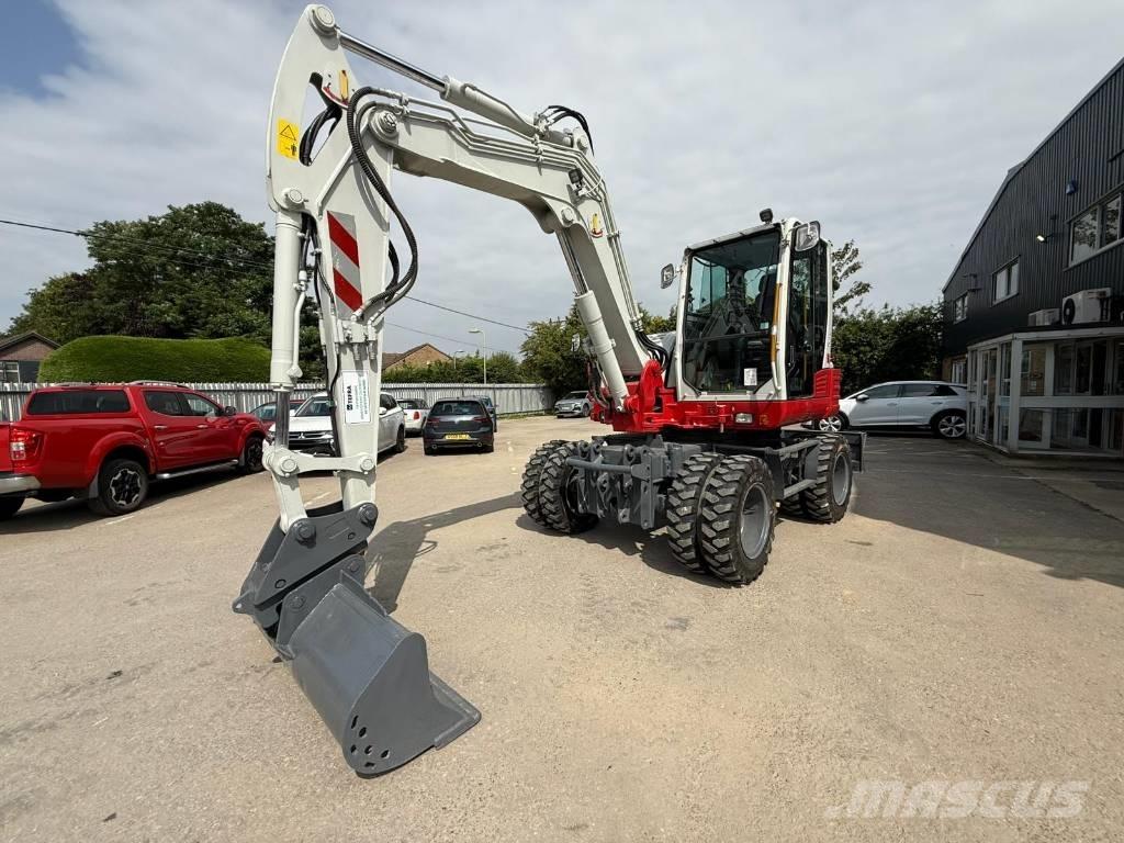 Takeuchi TB 295 W Pelle sur pneus