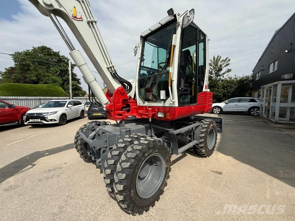 Takeuchi TB 295 W Pelle sur pneus