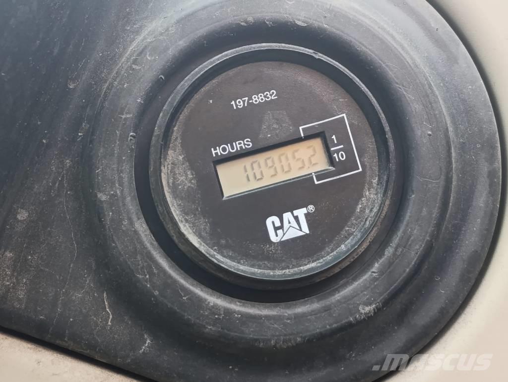 CAT M 318 C Pelle sur pneus