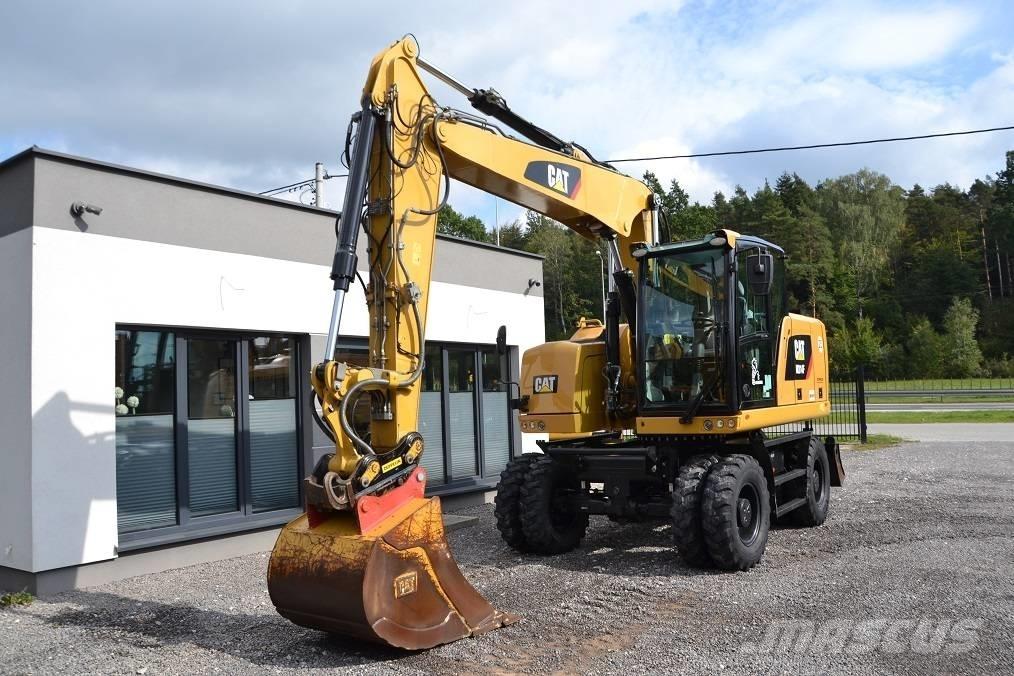 CAT M 314 F Pelle sur pneus