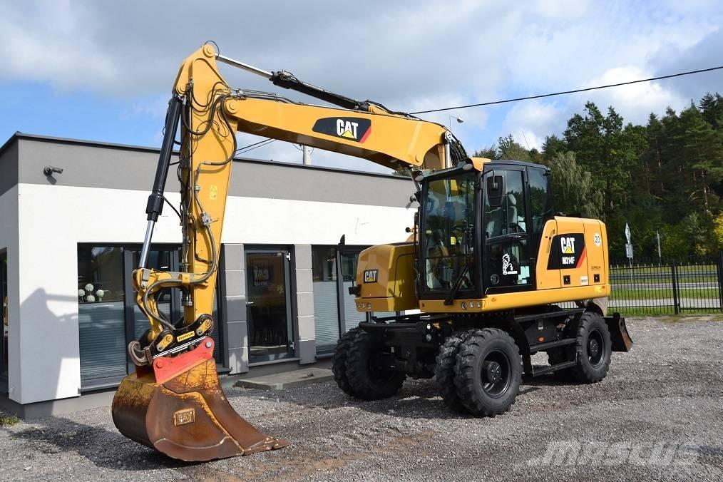 CAT M 314 F Pelle sur pneus