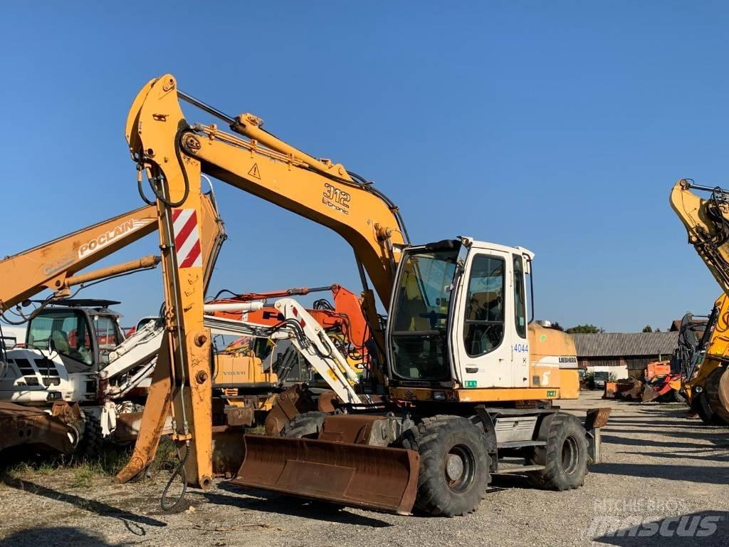 Liebherr A 312 Pelle sur pneus