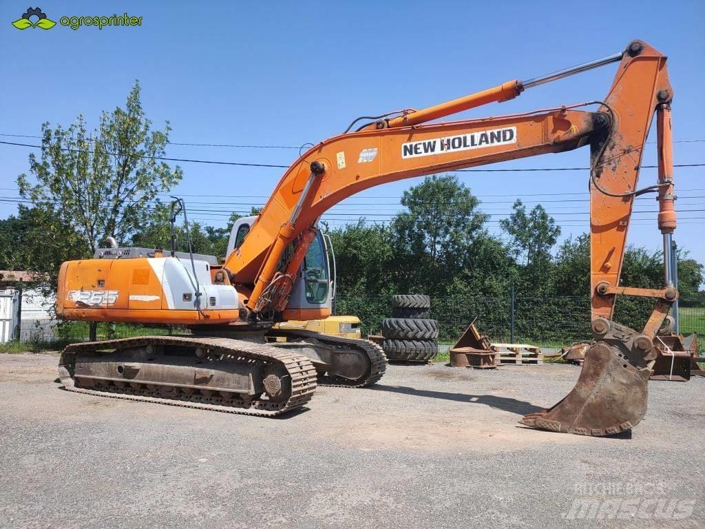 New Holland E 265 Pelle sur chenilles