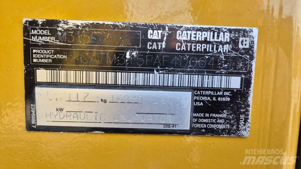 CAT M 315 F Pelle sur pneus