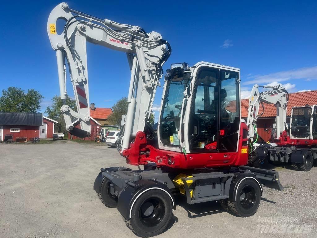 Takeuchi TB 370 W Pelle sur pneus