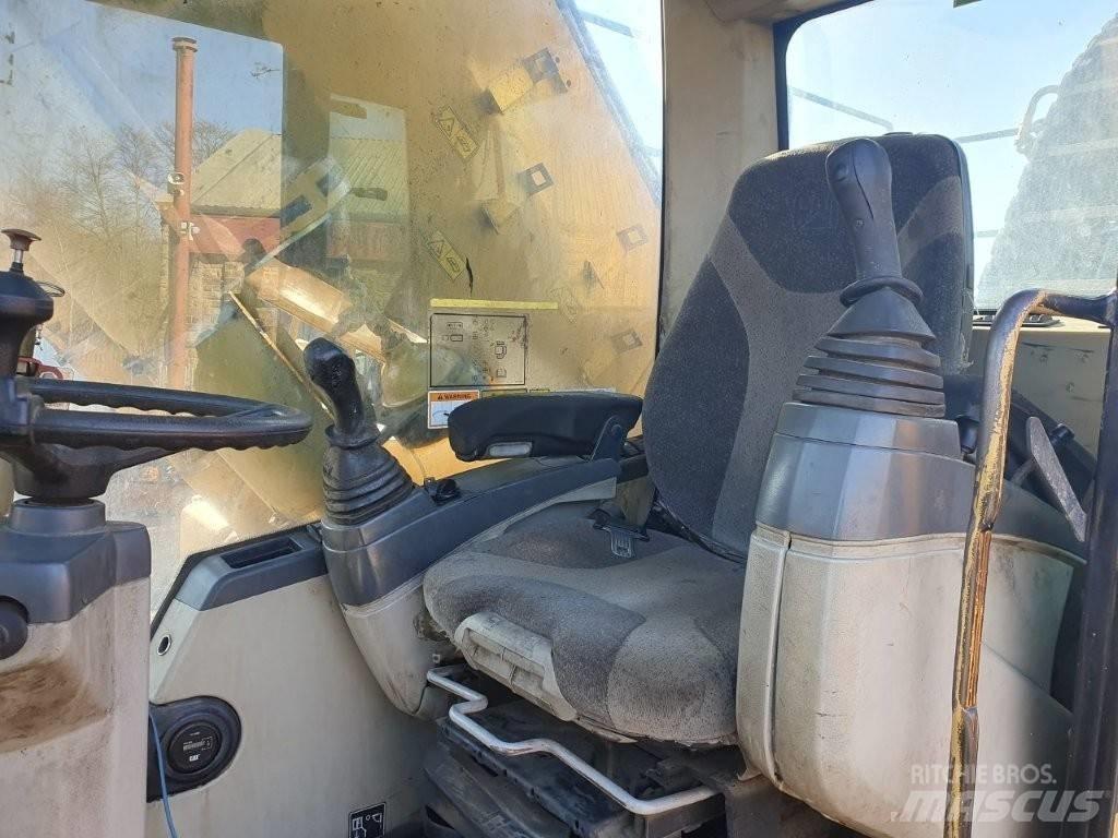CAT M 325 C MH Pelle à déchets