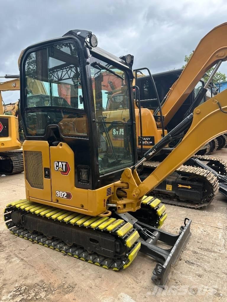CAT 302 Mini pelle < 7t