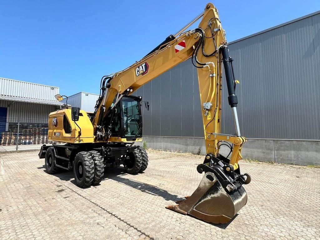 CAT M314-07 Pelle sur pneus
