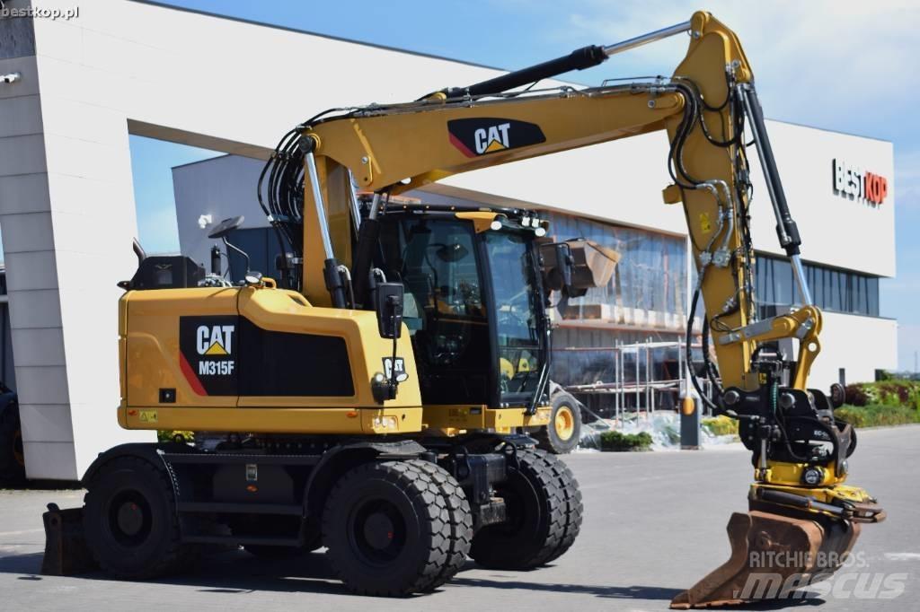 CAT M 315 F Pelle sur pneus