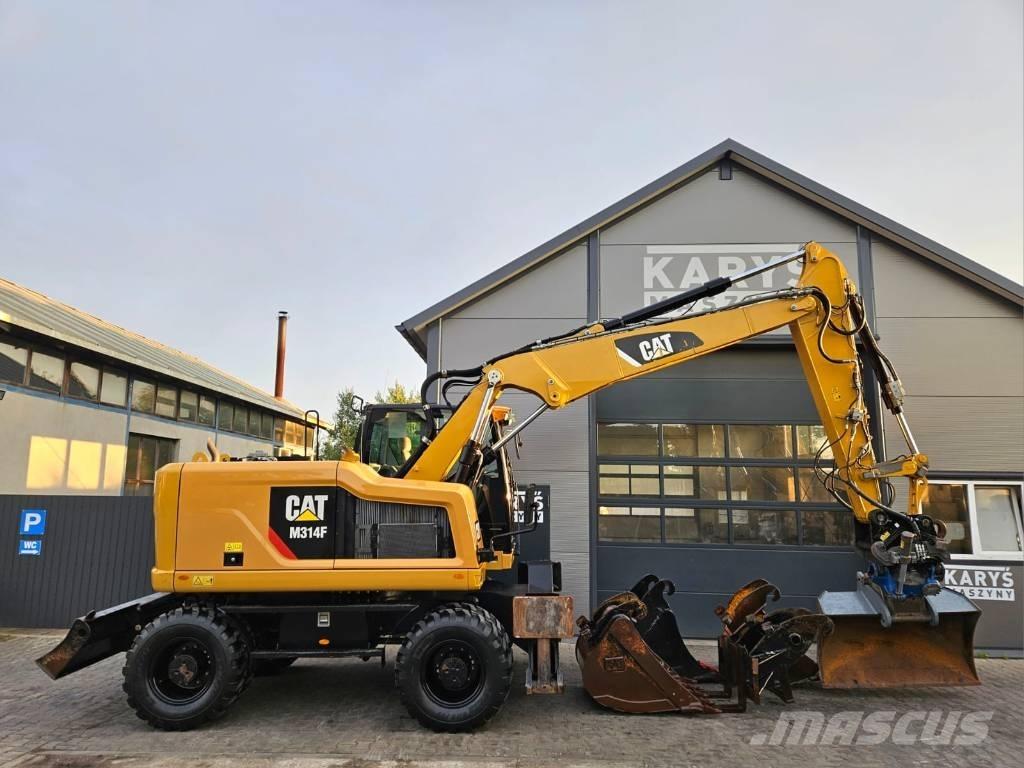 CAT M 314 Pelle sur pneus