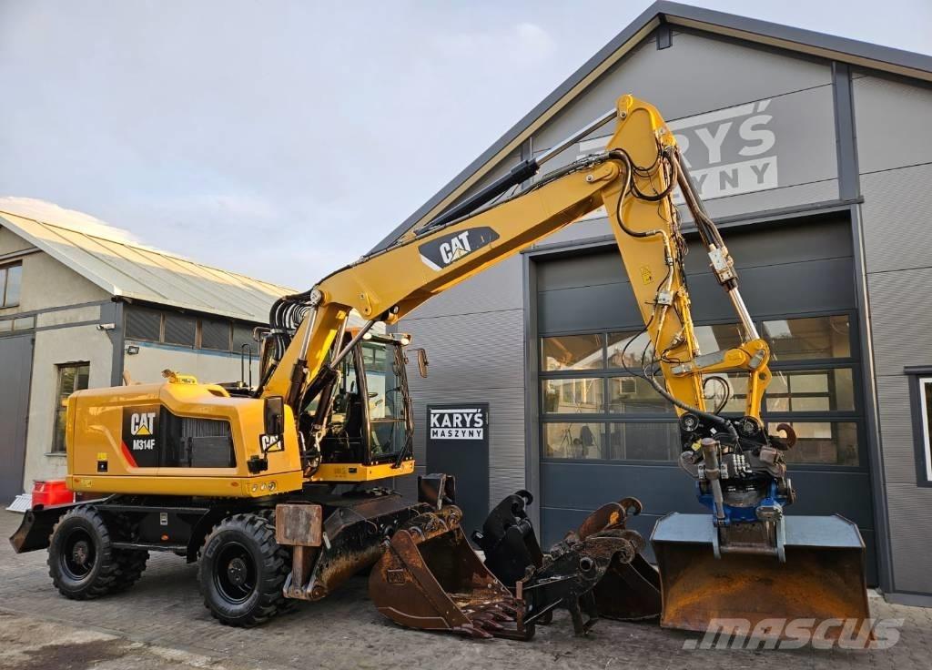 CAT M 314 Pelle sur pneus
