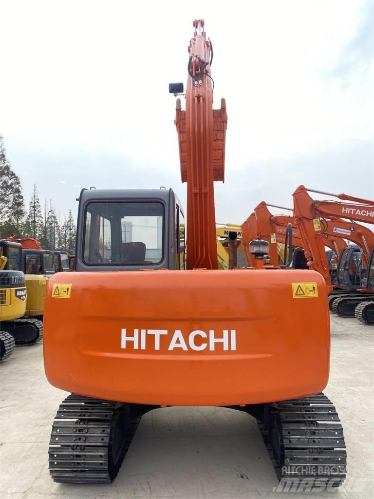 Hitachi EX60 Pelle sur chenilles
