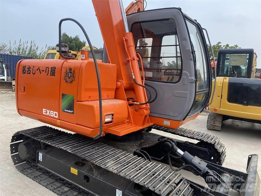 Hitachi EX60 Pelle sur chenilles