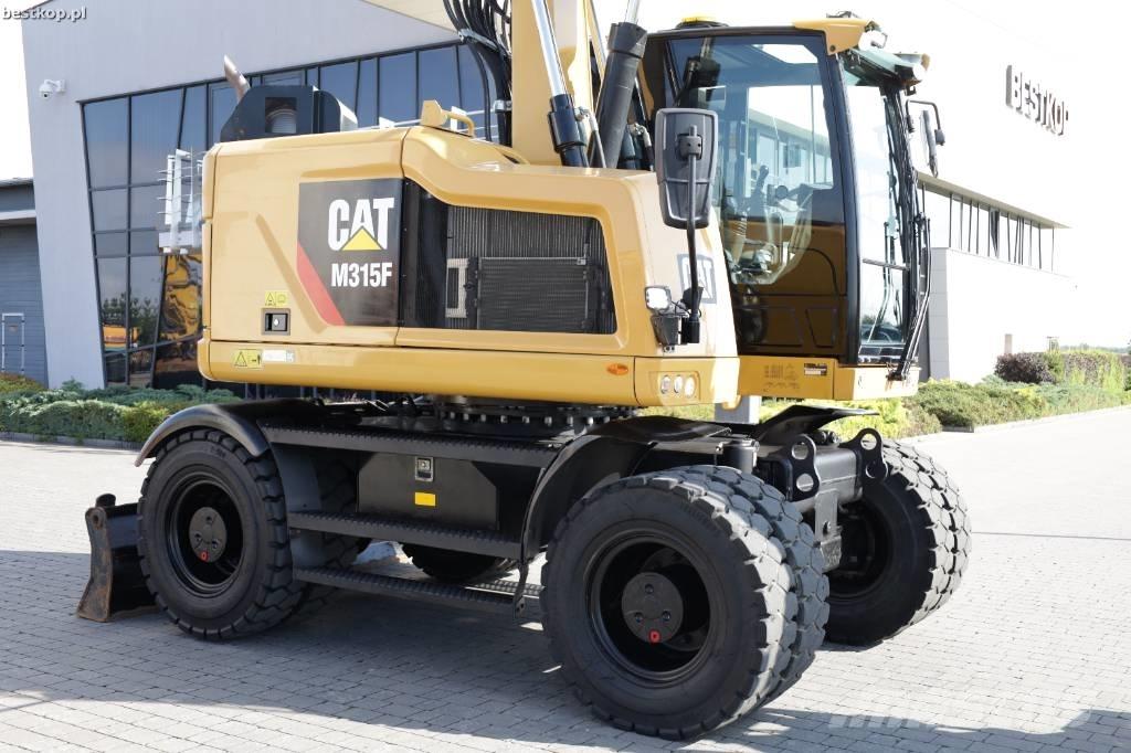 CAT M 315 F Pelle sur pneus