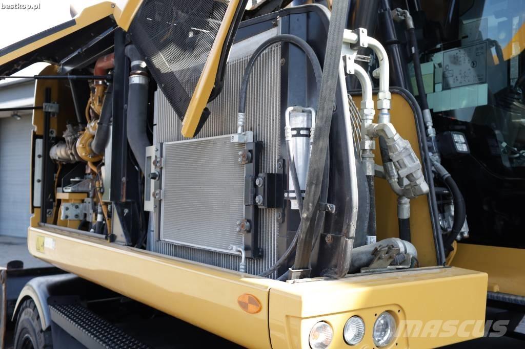 CAT M 315 F Pelle sur pneus