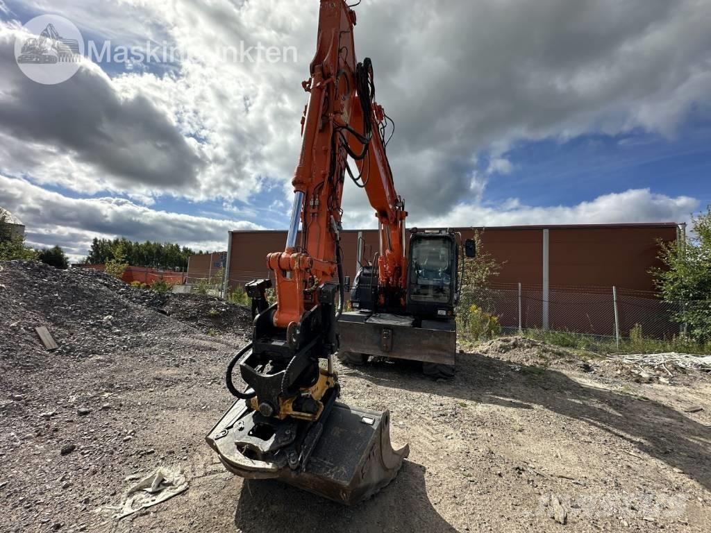 Hitachi ZX 140 W-5B Pelle sur pneus