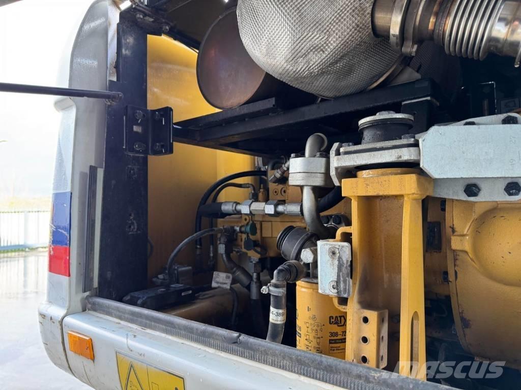 CAT M315D Pelle sur pneus