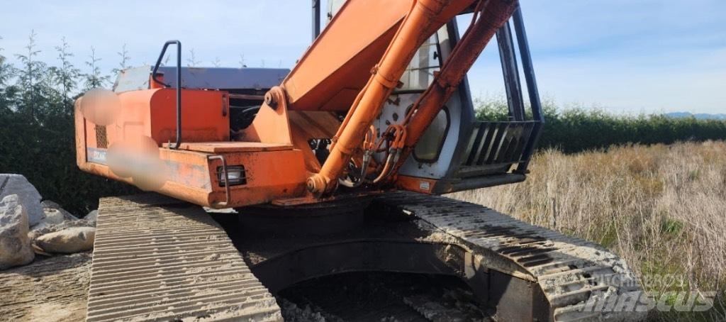 Hitachi EX 200 LC Pelle sur chenilles