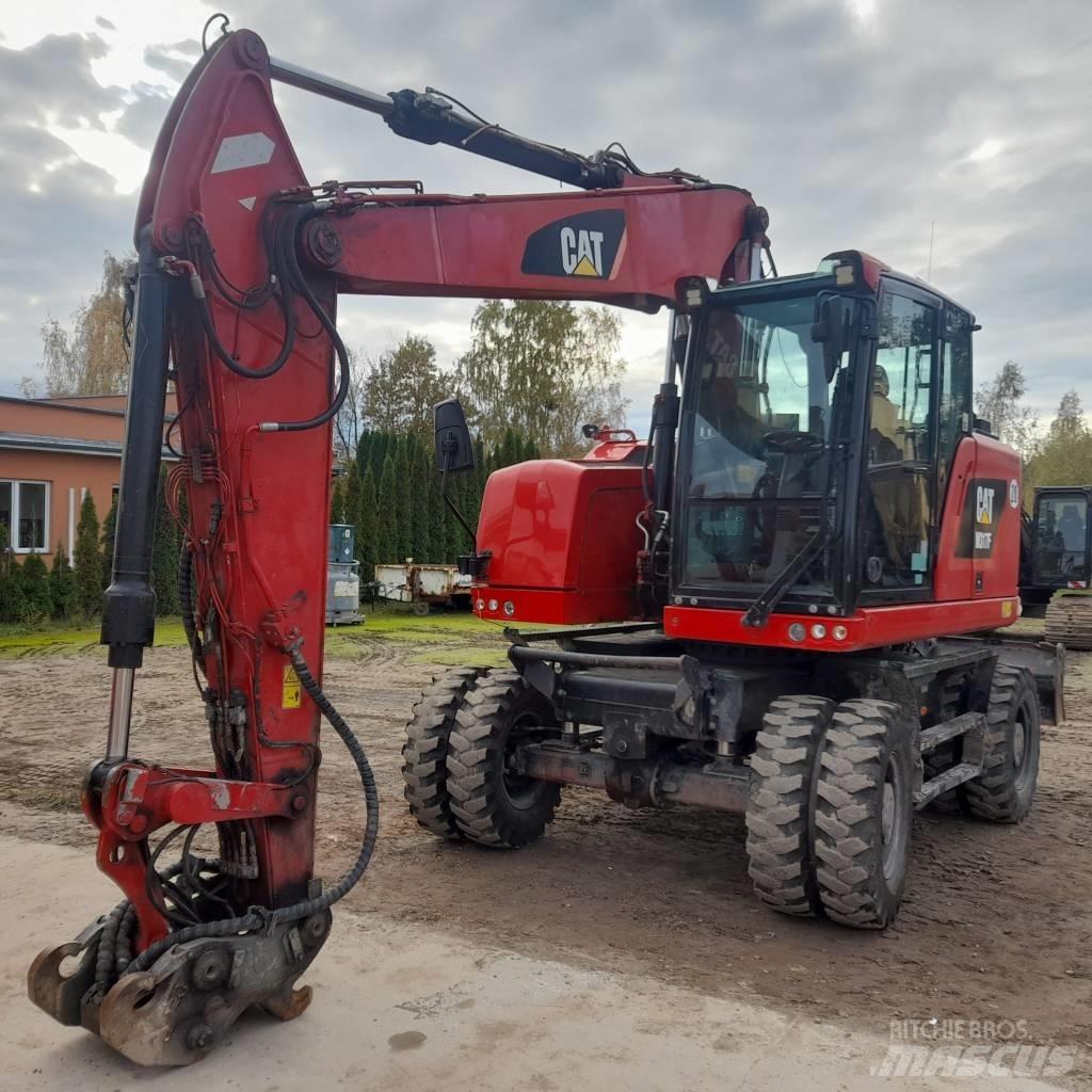 CAT M317 Pelle sur pneus