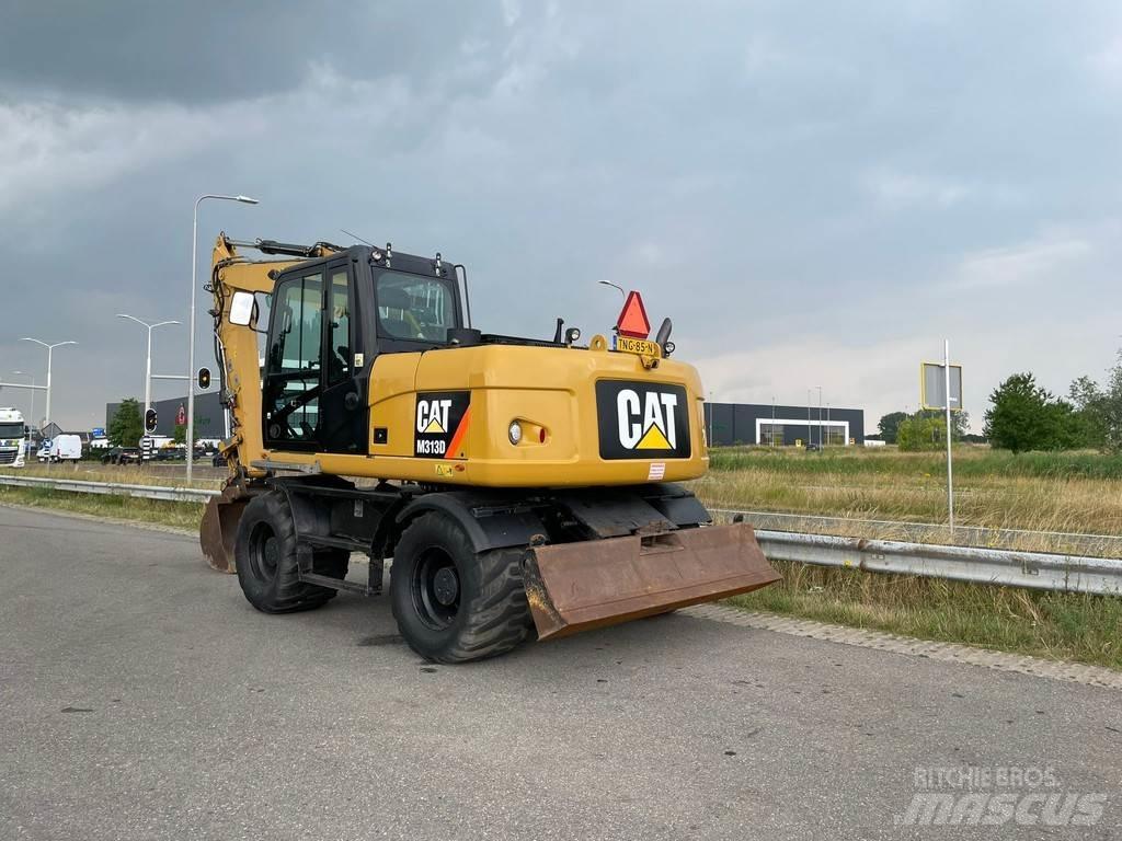 CAT M313D - CE Pelle sur pneus