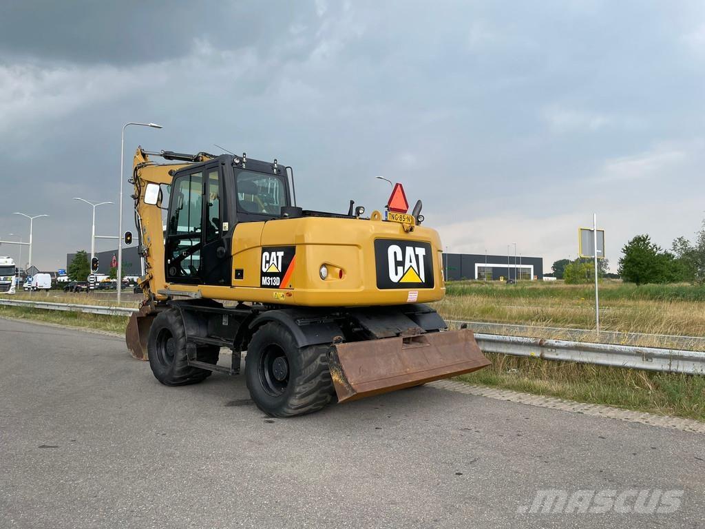 CAT M313D - CE Pelle sur pneus