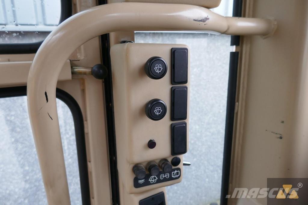 CAT 140H Ex-army Niveleuse