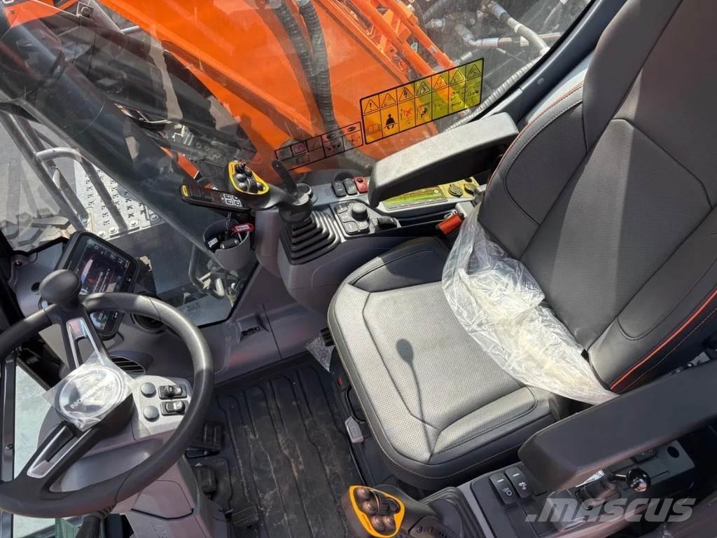 Develon DX140W-7 Pelle sur pneus