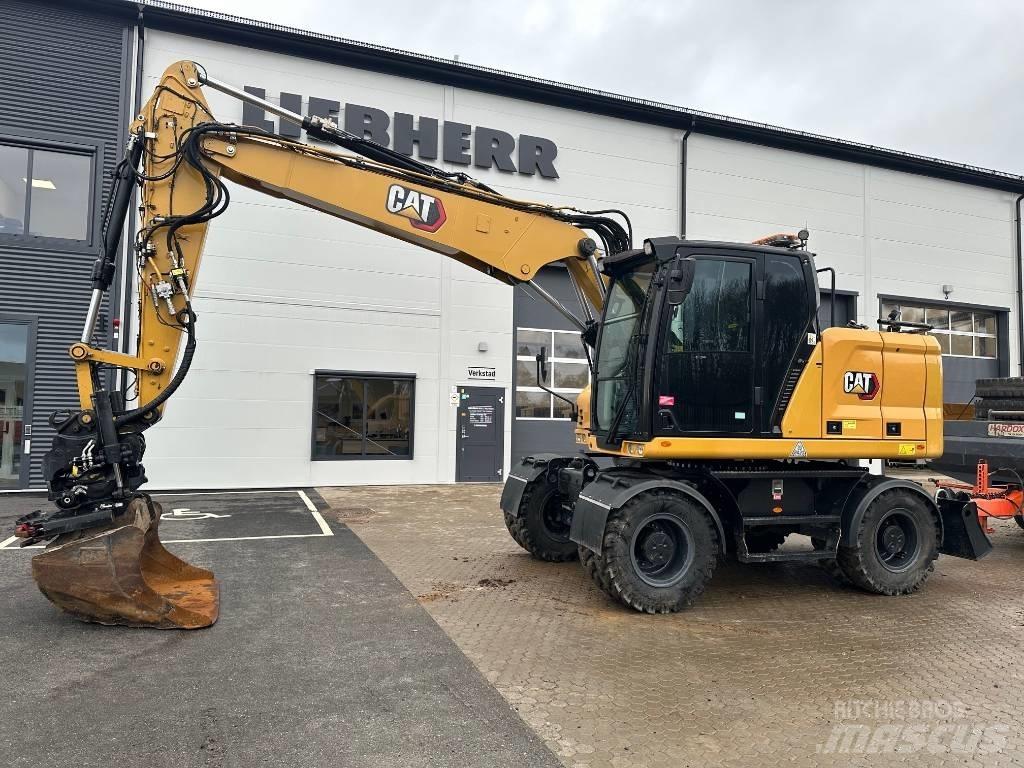 CAT M 314 Pelle sur pneus