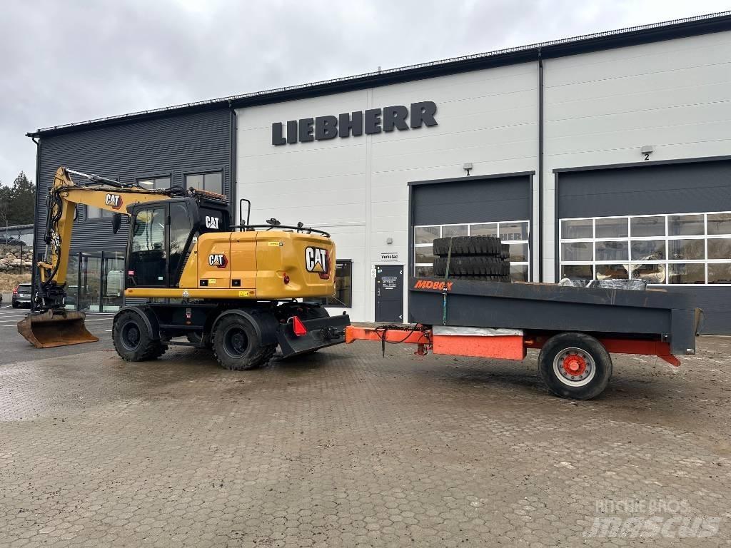 CAT M 314 Pelle sur pneus